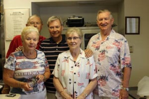 A roast chicken lunch was served to more than 250 residents.  Pictured are the cooking team of Dottie and Tony Frieler, and Jean and Harry Coutts, with Activity Board president Tim Davis.