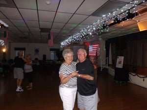 Jean Schreiber and George Meekins take a stroll on the dance floor.