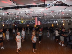 La Casa line dancers take over the floor to the music of Boot Scottin Boogie.