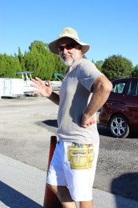 Gary Hiltz tried to look important as he takes a break during Saturday's car wash.