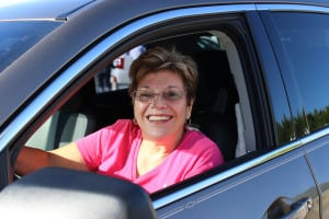 Marie Horgan leaves with a shining car and a big smile!